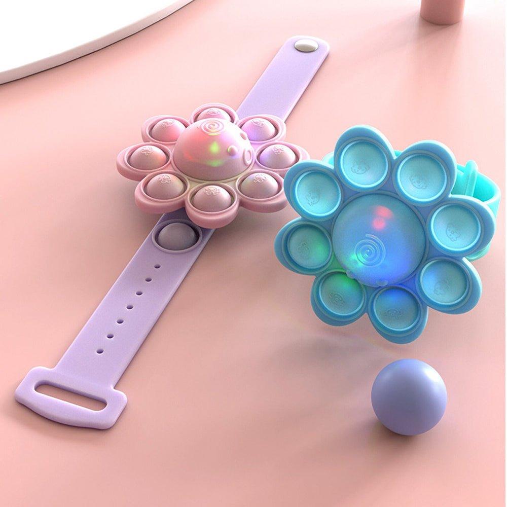 Spinning Light Up Pop Fidget Bracelet - Praktical ToysSpinning Light Up Pop Fidget Bracelet