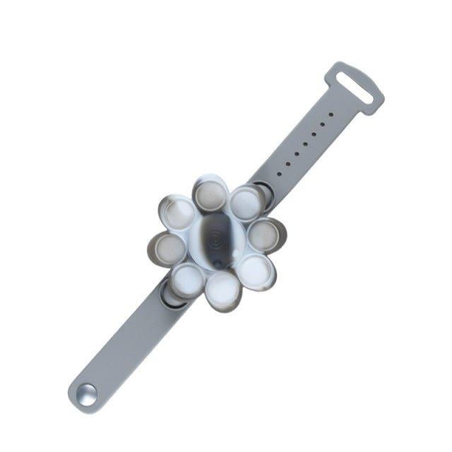 Spinning Light Up Pop Fidget Bracelet - Praktical ToysSpinning Light Up Pop Fidget Bracelet